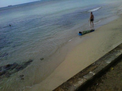 Man on Sand - Queens Beach, Kapiolani