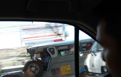 Jeepney through the window - Manila 2012